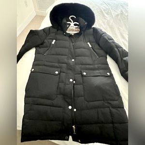 Calvin Klein puffer coat with gold detailing, leopard print lining.